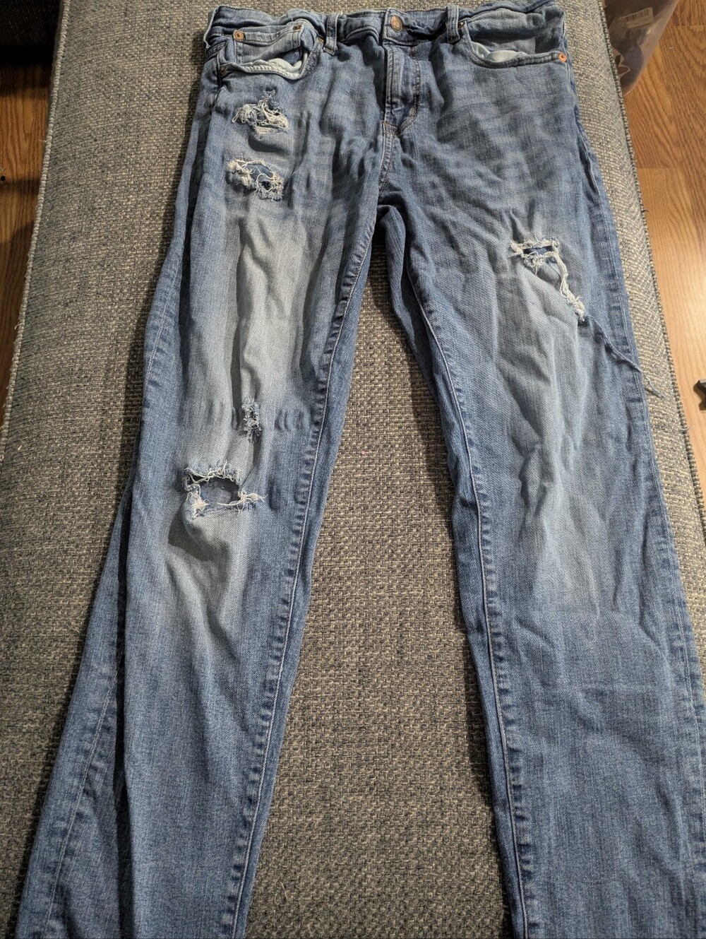 Distressed Light Blue Denim Jeans